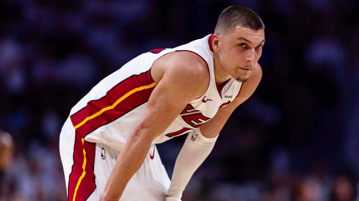Miami Heat guard Tyler Herro (14) bends over in between plays during the second half of Game 4 of the Eastern Conference NBA Playoffs against the Cleveland Cavaliers at Kaseya Center on April 28, 2025, in Miami.