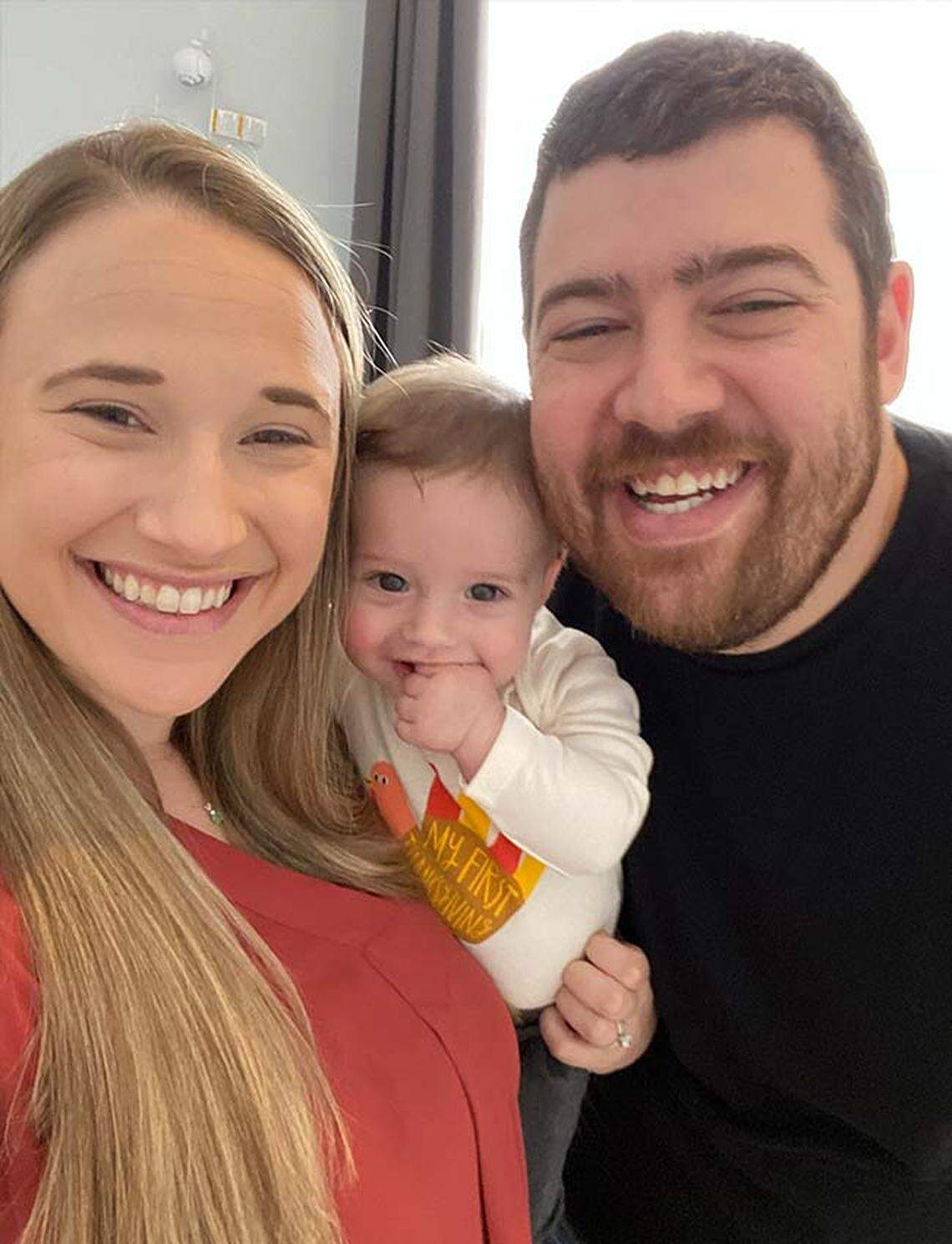 Merick Lewin, candidate for the District 6 race of the Broward County School Board, poses along his wife, Michelle Lewin, and their 1-year-old son.