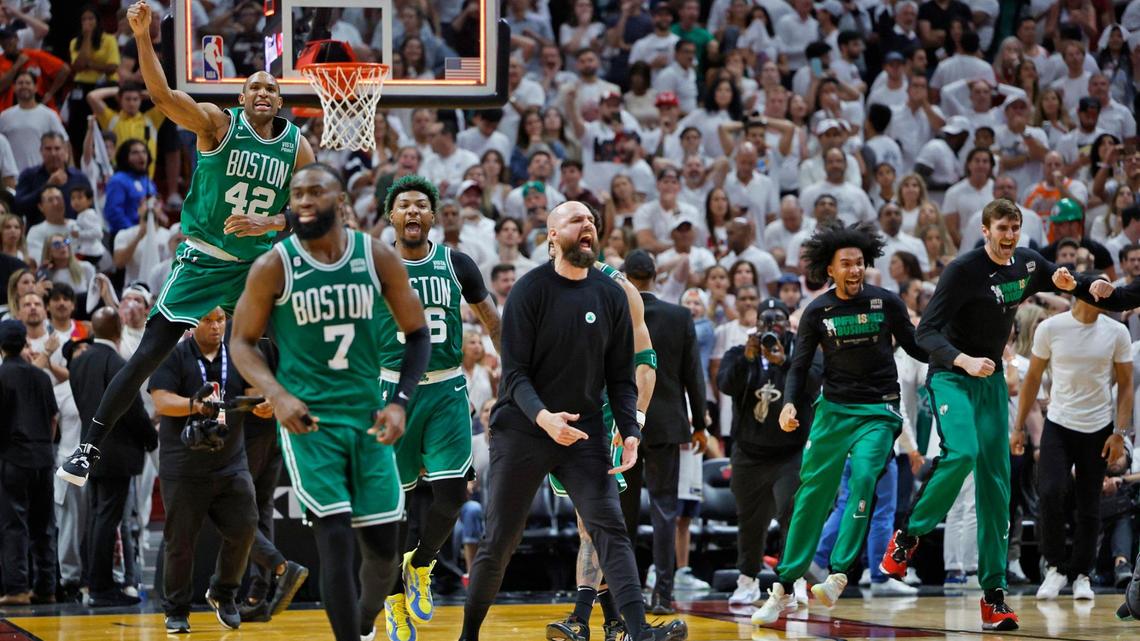 The Boston Celtics react after defeating the Miami Heat in the final seconds of Game 6 of the Eastern Conference finals at the Kaseya Center in Miami on Saturday, May 27, 2023.