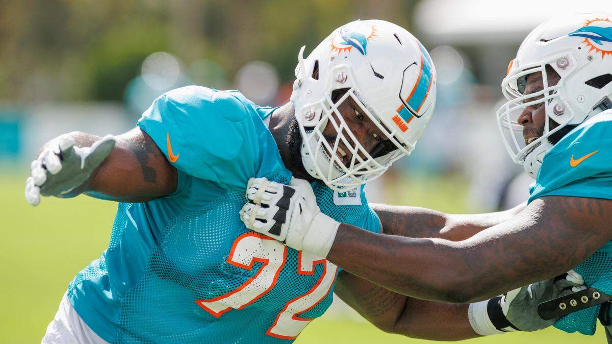 Miami Dolphins offensive tackles Terron Armstead (72) and Greg Little (75) does drills during an NFL football training camp with the Philadelphia Eagles at Baptist Health Training Complex in Hard Rock Stadium on Wednesday, August 24, 2022 in Miami Gardens, Florida.