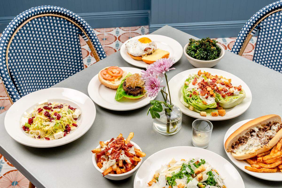 Some of the menu choices at Whitmans in Miami Beach, which features burgers, sandwiches and salads.