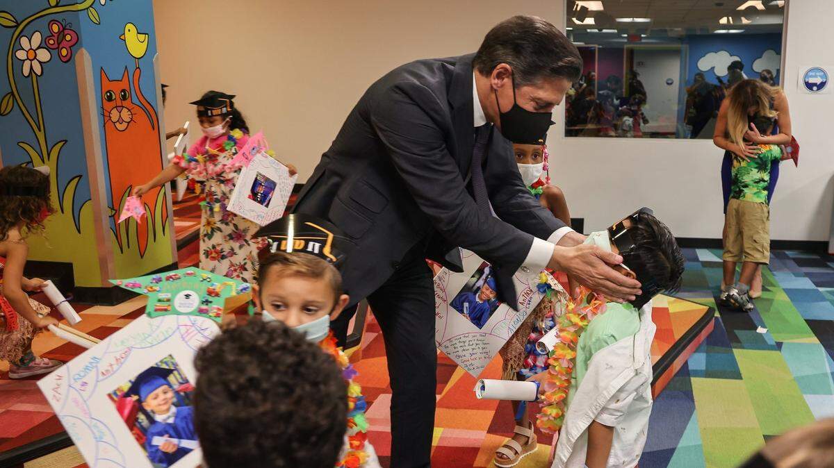 Superintendent Alberto Carvalho, center, bids iPrep Academy Pre-K students a wonderful summer as Aillette Rodriguez-Diaz, assistant principal grades, gives out hugs in the background to departing students at the end of the school year, Wednesday, June 9, 2021. Students will likely be required to wear masks to start the new school year on Monday, August 23, 2021.