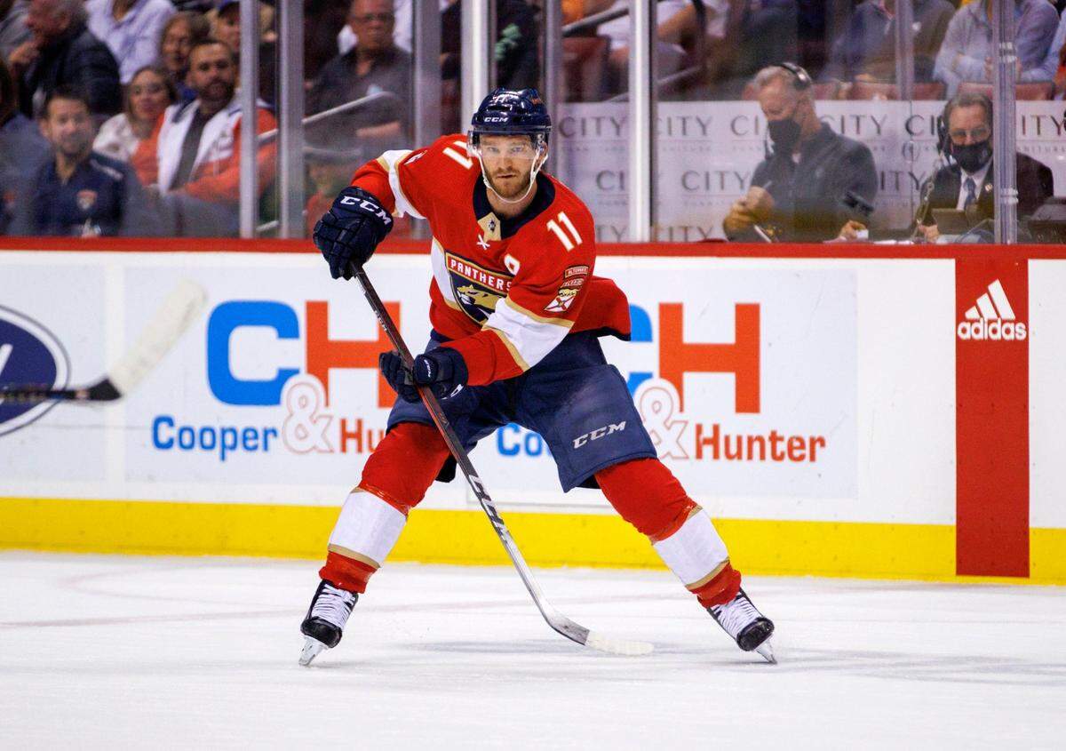 Florida Panthers left wing Jonathan Huberdeau (11) passes the puck during the first period of an NHL game against the Toronto Maple Leafs at the FLA Live Arena on Saturday, April 23, 2022 in Sunrise, Fl.