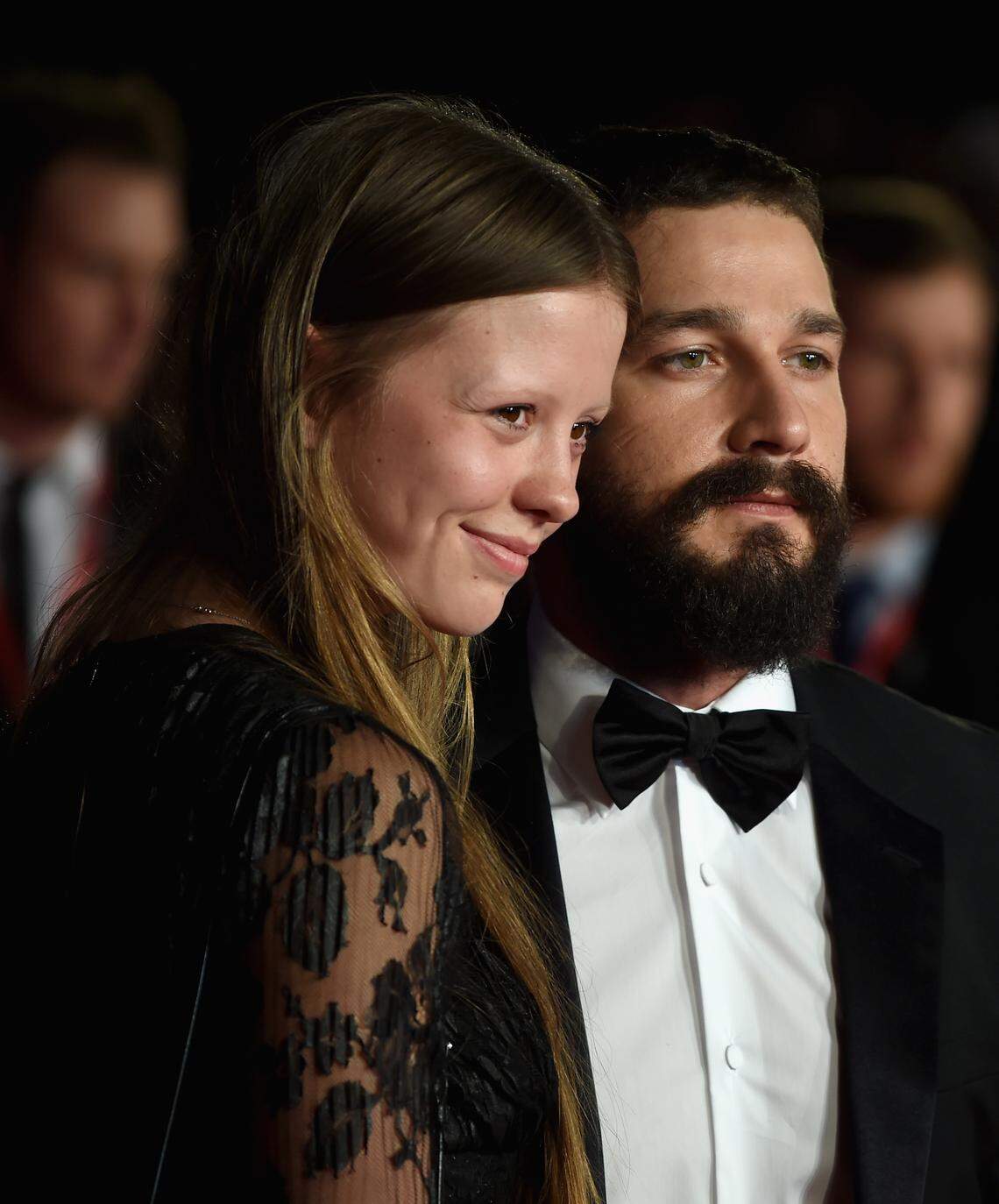 LONDON, ENGLAND - OCTOBER 19: Mia Goth and actor Shia LeBeouf attend the closing night European Premiere gala red carpet arrivals for "Fury" during the 58th BFI London Film Festival at Odeon Leicester Square on October 19, 2014 in London, England. (Photo by Gareth Cattermole/Getty Images for BFI)