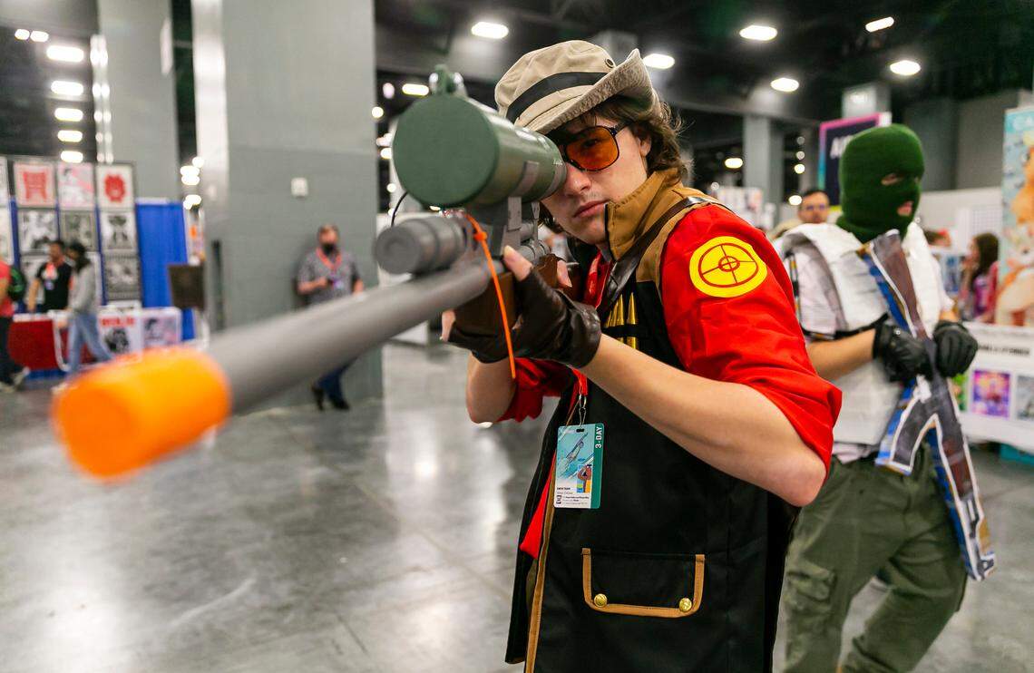 Raphael Diez cosplays as the sniper from the video game “Team Fortress 2” during Florida Supercon.