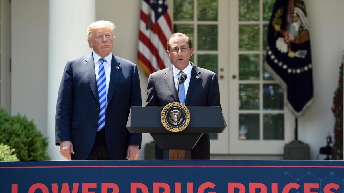 Secretary of Health and Human Services Alex Azar speaks about lowering drug prices as President Donald Trump looks on during an event in the Rose Garden of the White House in Washington, D.C., on May 11, 2018. (Olivier Douliery/Abaca Press/TNS)
