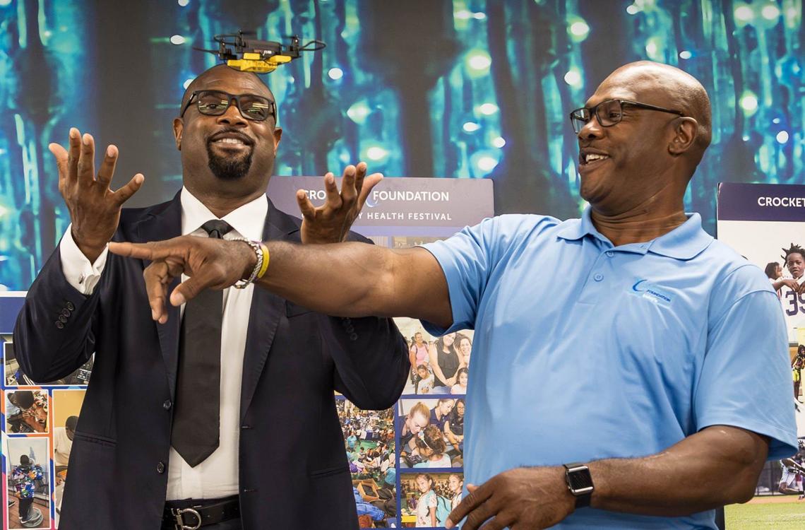 President and CEO of the Crockett Foundation Henri Crockett (left) and Vice President Zack Crockett (right) oversee a drone class on Friday, Sept. 20, 2024, in Fort Lauderdale, Fla. at the Crockett Foundation. With the goal of inspiring Broward youth with innovative technologies, the two retired NFL brothers established the foundation in 2002.