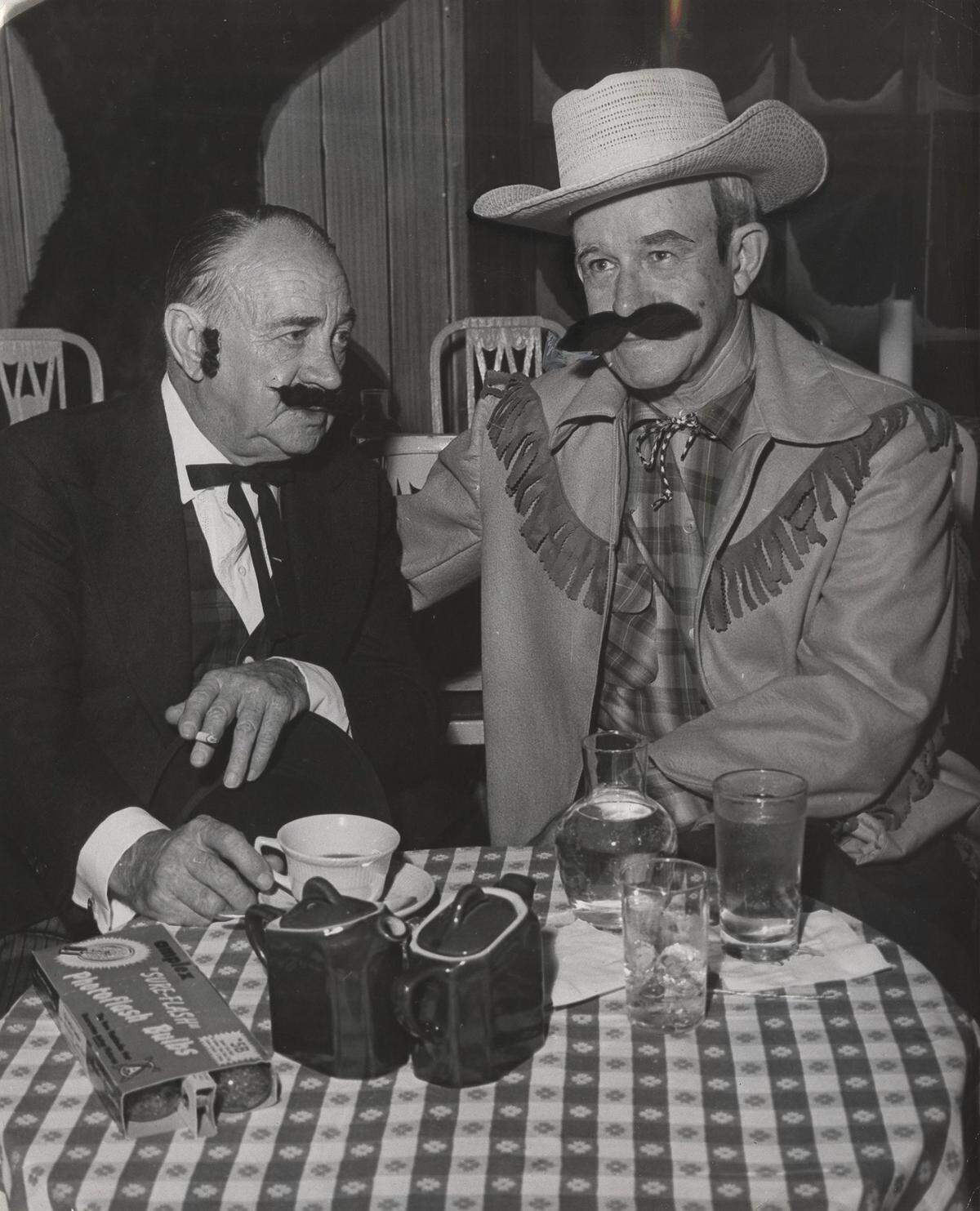 Spratt Mangus and Gen. Omar Bradley dressed in costume for an event at the Surf Club in Surfside on March 7, 1959.