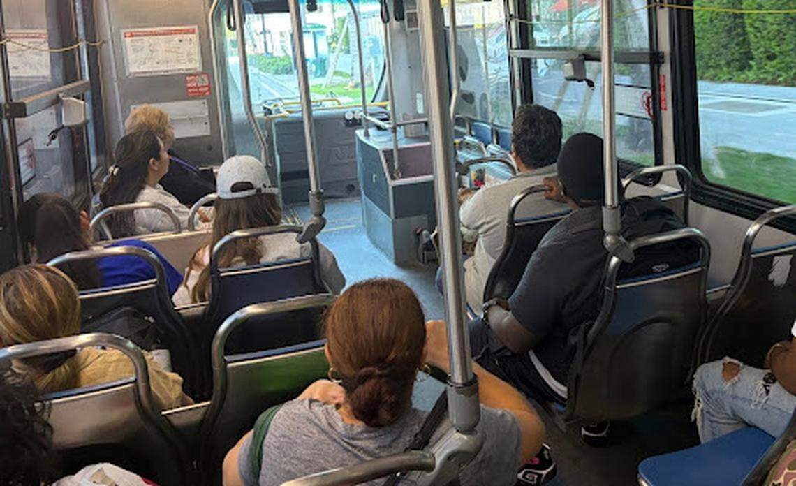 Passengers of the Route 3 bus riding along Biscayne Boulevard.