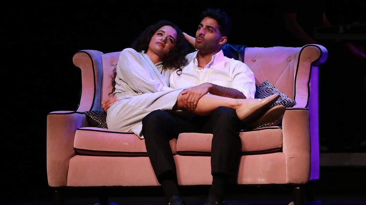Claudia Yanez and Jason Canela as Gloria and Emilio Estefan take a break from touring life.