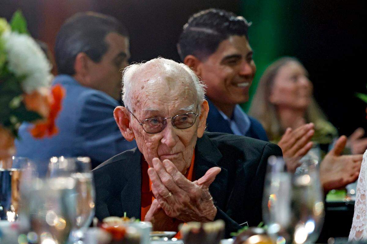 G. Holmes Braddock, 98, is honored during the University of Miami’s Sports Hall of Fame & Museum 54th Induction Banquet on campus at the Watsco Center in Coral Gables, Florida on April 18, 2024.