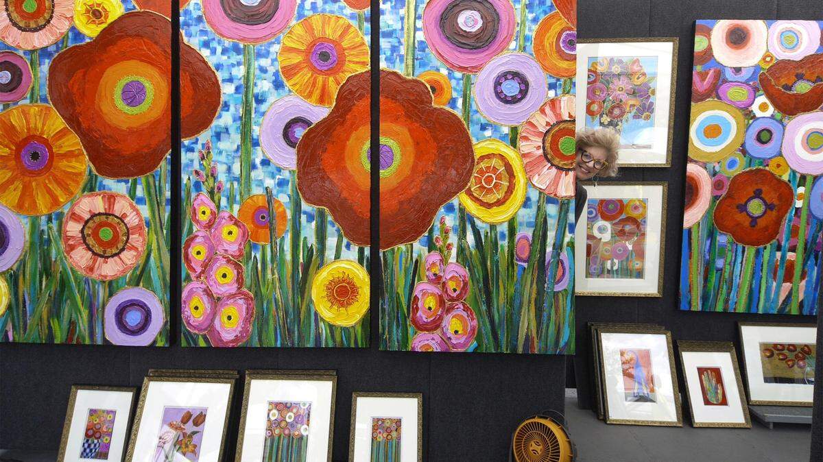 Artist Maria Reyes Jones shows off her work at the 2018 Coconut Grove Arts Festival, always held on Presidents’ Day weekend.