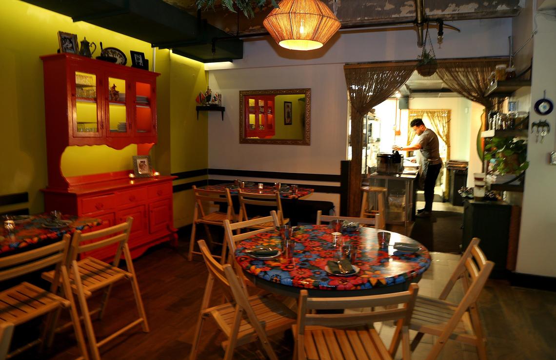 In a tiny 21-seat restaurant, one of Miami’s top chefs, Timon Balloo, is redefining what home cooking means to him. The new restaurant is a tribute to his Asian-Caribbean roots.