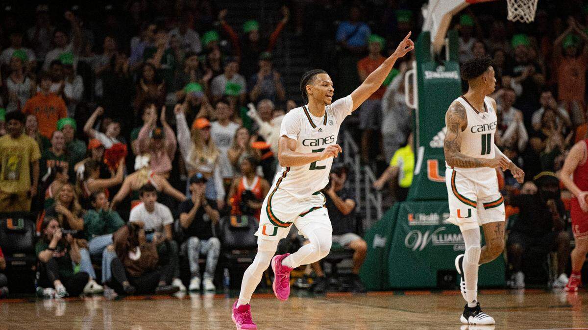 Hurricane’s Isaiah Wong (2) points to the sky after making a three pointer during the second half of a NCAA men’s basketball game between the University of Miami Hurricanes and the Cornell Big Red on Monday, April 25, 2022, in Miami. Miami won 107-105.