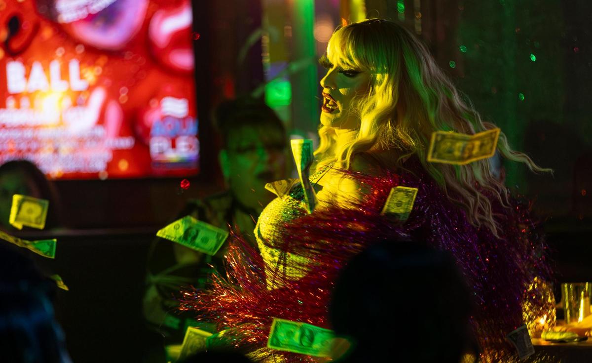 Drag queen Rianna Petrone performs as Taylor Swift during a celebrity impersonation show at Aquaplex on Thursday, Jan. 23, 2025, in Fort Lauderdale, Fla. Aquaplex, formerly known as Lips, offers guests a variety of drag shows along with food and drinks.