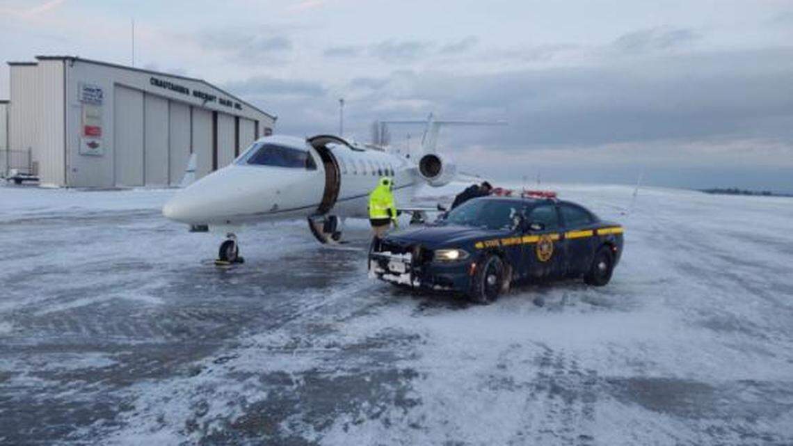 A couple stranded on the way to a woman’s heart transplant was helped by New York State Police during a Thanksgiving snow storm.
