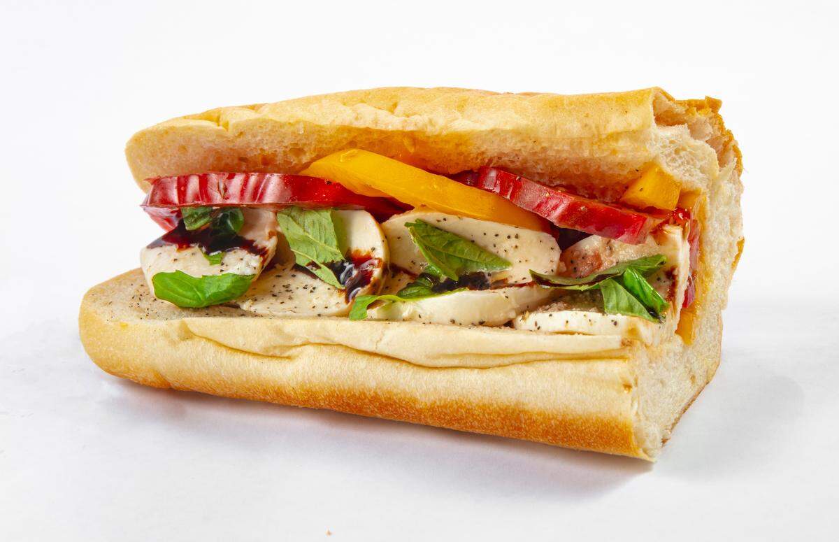 Heirloom tomatoes, locally made mozzarella, basil and balsamic vinegar make up one of Vinaigrette’s vegetarian options.