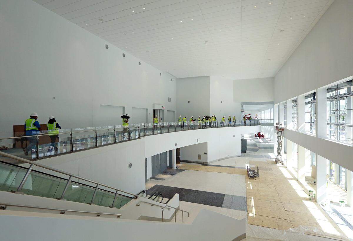 Work at the Miami Beach Convention Center on Tuesday, August 8, 2017. Tourism leaders want to build a convention center headquarter hotel as soon as possible, to closely coincide with the convention center's September reopening.