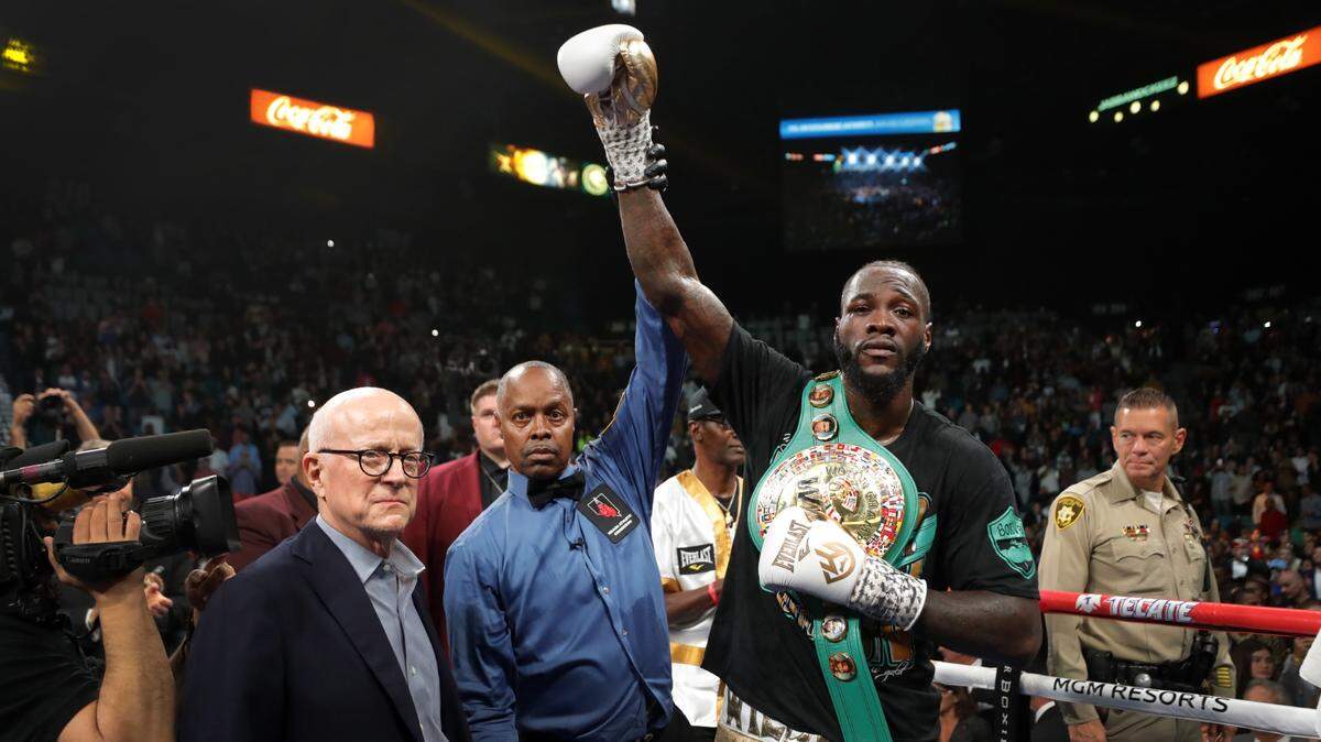 LAS VEGAS, NEVADA - NOVEMBER 23: WBC heavyweight champion Deontay Wilder poses with referee Kenny Bayless after defeating Luis Ortiz in their title fight at MGM Grand Garden Arena on November 23, 2019 in Las Vegas, Nevada. Wilder won with a seventh-round knockout. (Photo by Steve Marcus/Getty Images)