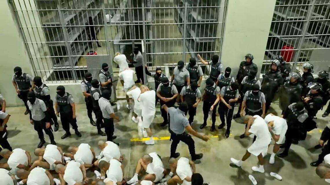 A screengrab from a video obtained from the El Salvador Presidential Press Office shows alleged members of the Venezuelan criminal organization Tren de Aragua, deported by the U.S. government, detained at the Terrorism Confinement Center in Tecoluca, El Salvador, on March 16, 2025.