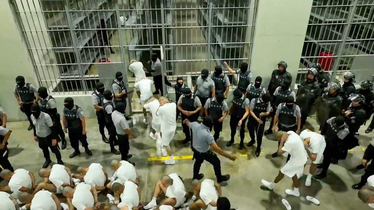 A screengrab from a video obtained from the El Salvador Presidential Press Office shows alleged members of the Venezuelan criminal organization Tren de Aragua, deported by the U.S. government, detained at the Terrorism Confinement Center in Tecoluca, El Salvador, on March 16, 2025.