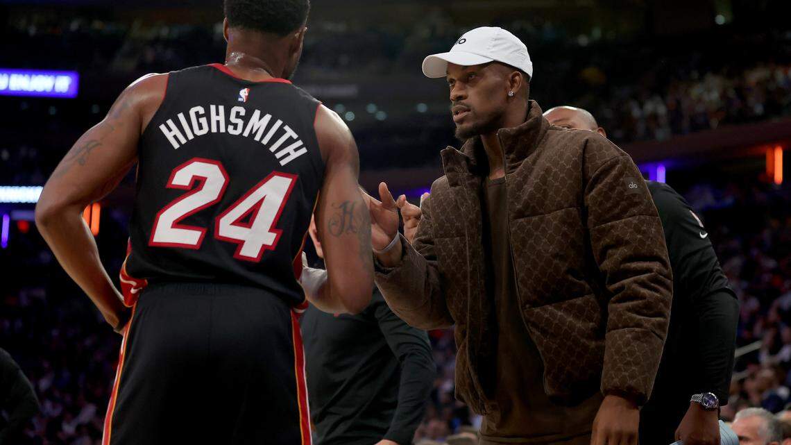 May 2, 2023, New York, N.Y.: Miami Heat injured forward Jimmy Butler (right) talks to forward Haywood Highsmith (24) during the second quarter of Game 2 of the 2023 NBA second round playoff series against the New York Knicks at Madison Square Garden.