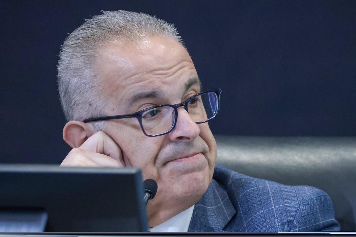 Rey Valdes, the City Manager of Doral, gestured following a heated debate over the resolution limiting the vice mayor role, a rotating position. He was questioned by the new vice mayor, Maureen Porras, who asked if he had reviewed or evaluated the fiscal impact of the approved resolution. Valdes admitted that he had not. Porras filed a lawsuit in court on Wednesday, December 18, 2024.