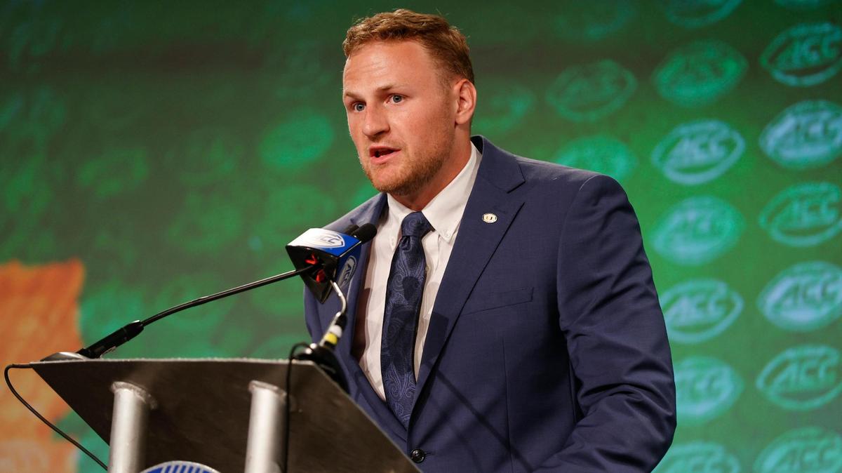 Miami quarterback Tyler Van Dyke answers a question at the NCAA college football Atlantic Coast Conference Media Days in Charlotte, N.C., Thursday, July 21, 2022. (AP Photo/Nell Redmond)