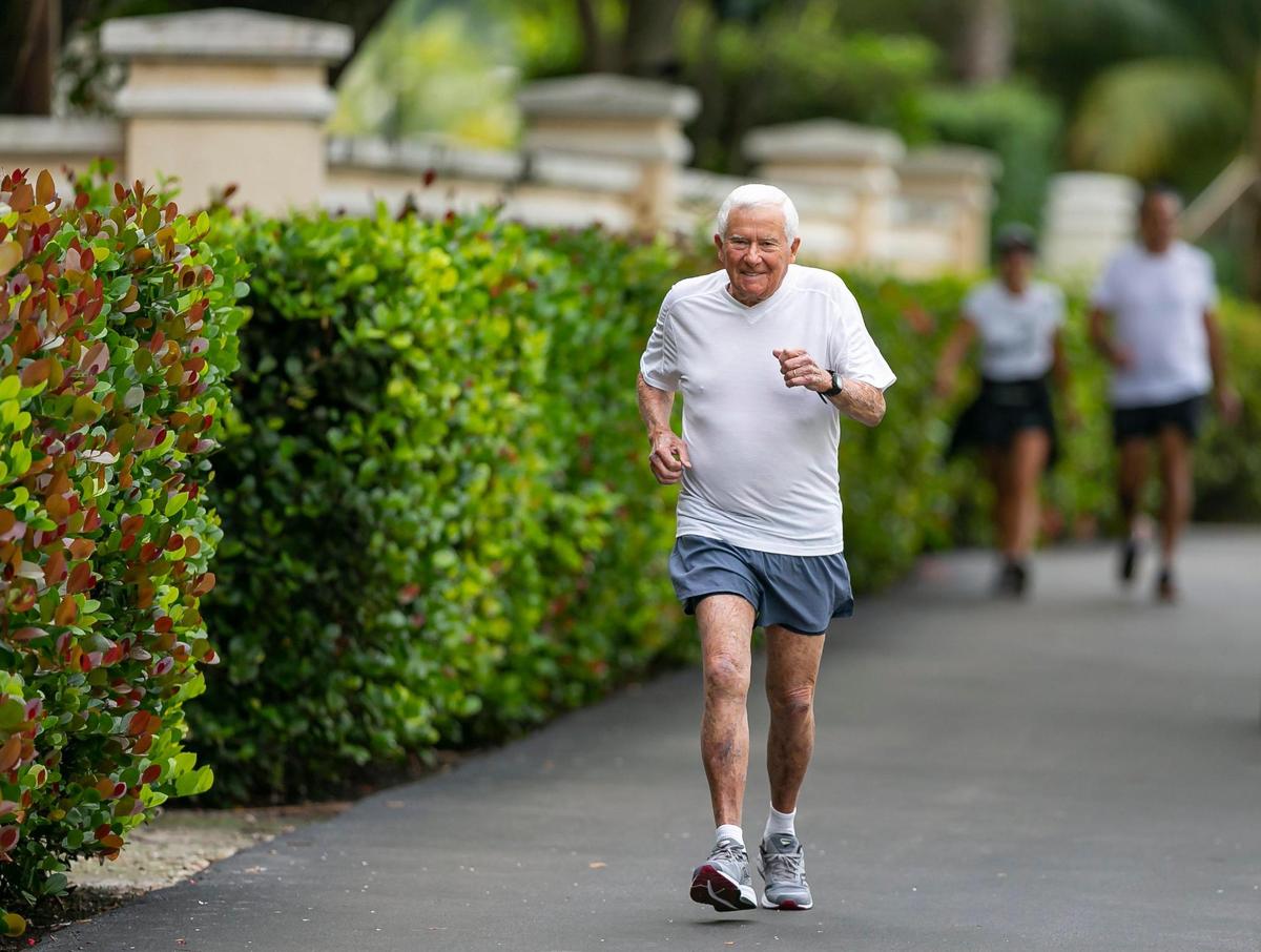 Lewis Ress, 91, jogs at the Don Soffer Exercise Trail in Aventura, Florida on Saturday, January 22, 2022. Ress, a former trial lawyer who still works and is involved in the South Florida community, will compete in the half marathon portion of the Miami Marathon on February 6, 2022.