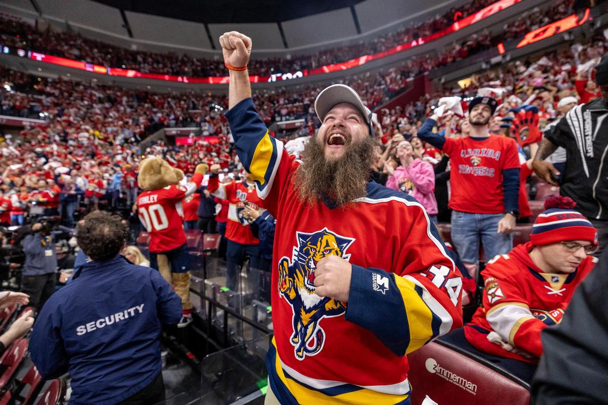 Fans celebrate Floridas 4-1 lead during the second period of Game 3 in the NHL Stanley Cup Final series at Amerant Bank Arena on Monday, June 9, 2025, in Sunrise, Fla.