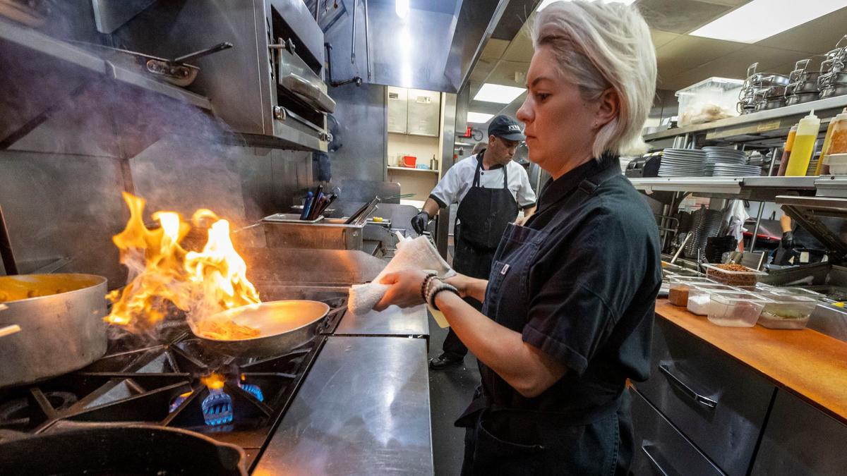 Chef Eileen Andrade works in the kitchen at Finka Table & Tap in Kendall.