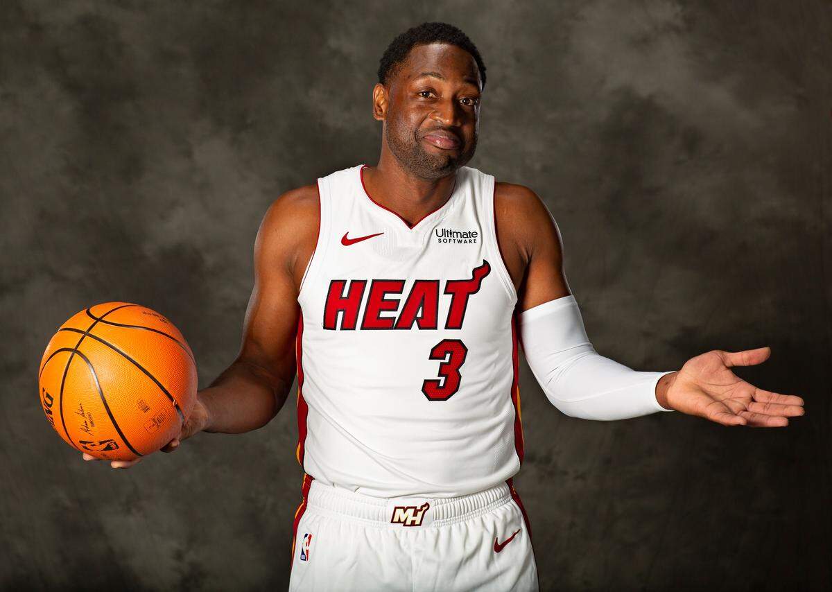 Miami Heat’s Dwyane Wade (3) poses for a photograph during Miami Heat media day at the American Airlines Arena in Miami on Monday, September 24, 2018.