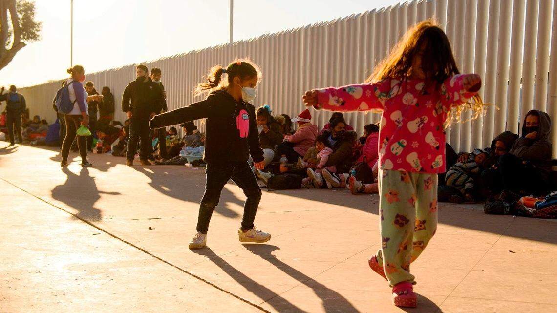 Migrant children play at the El Chaparral border crossing in Tijuana, Mexico in February.