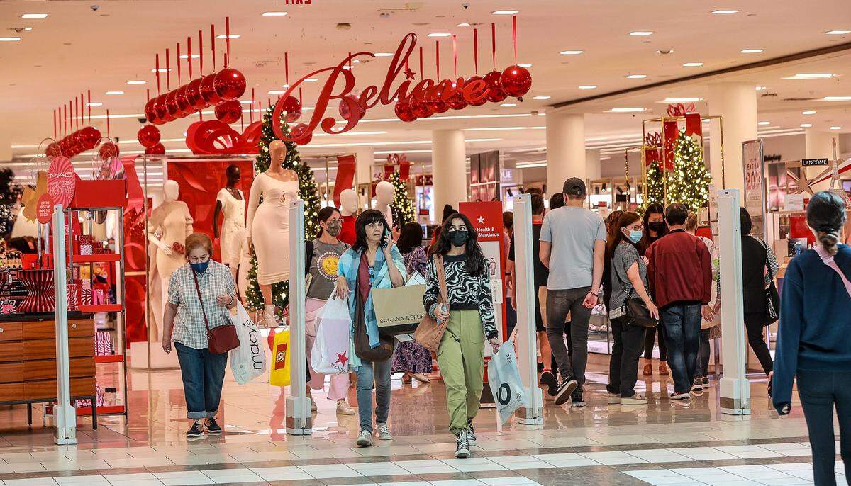 Shoppers flood the Macy’s store at Dadeland Mall looking for Black Friday deals on Nov. 26, 2021.