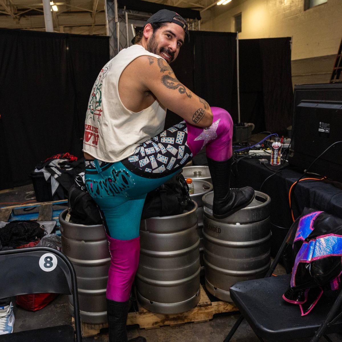 Adrian Castro, also known as Domino, strikes a pose before the 43rd Bash at the Brew.
