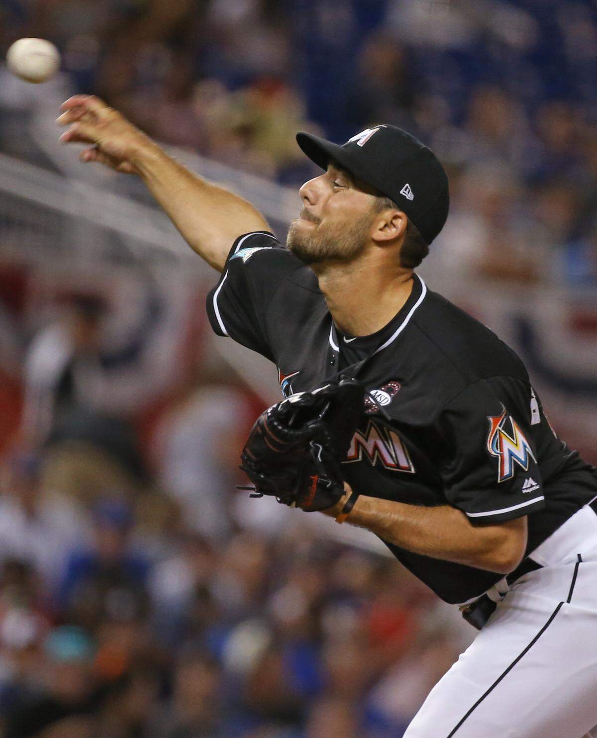 Miami Marlins pitcher Kyle Barraclough pitches during the eighth inning of a Major League Baseball game against the Chicago Cubs at Marlins Park on Friday, March 30, 2018 in Miami.