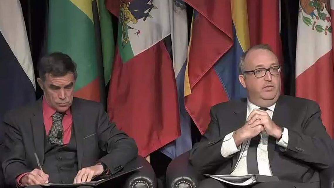 Professor Anthony Pereira, director of Florida International University’s Kimberly Green Latin America and Caribbean Center, speaks with Canada’s Ambassador to Haiti Sébastien Carrière, right, during the second day of the Eighth Annual FIU Hemispheric Security Conference.