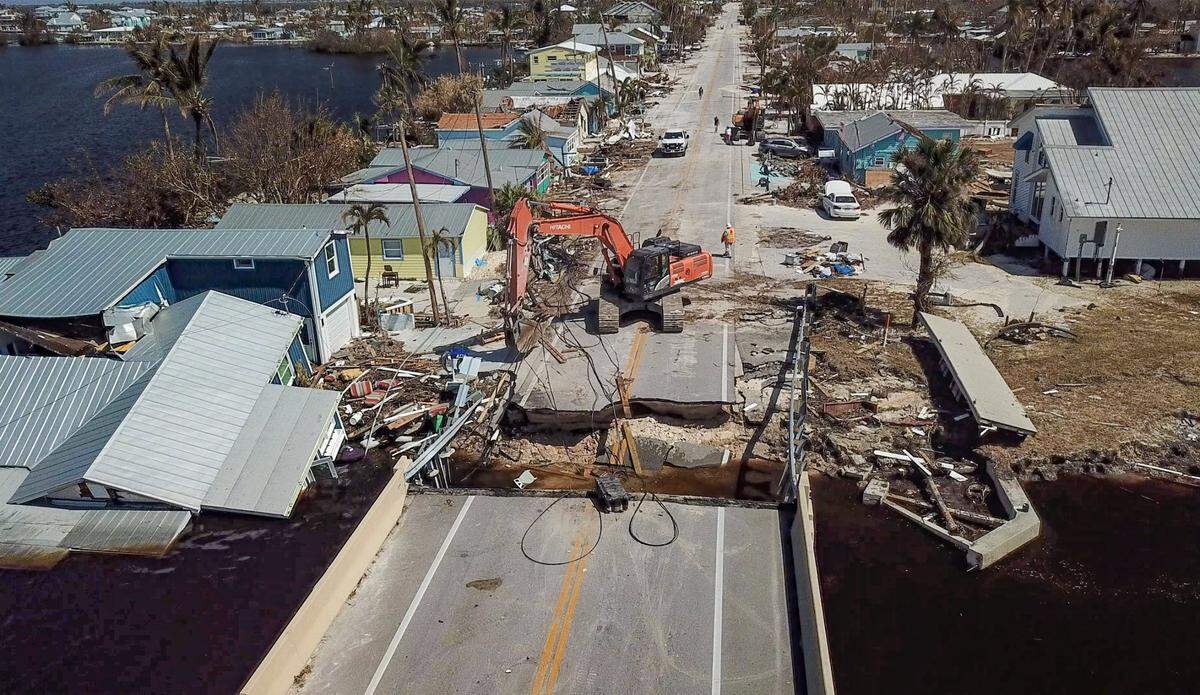 The Matlacha bridge to Pine Island as it’s being repaired on Tuesday, Oct. 4, 2022. Hurricane Ian significantly damaged the roadway leading to the bridge, preventing thousands of residents from Pine Island in Southwest Florida from returning to their homes after they evacuated before the powerful storm hit the area on Wednesday, Sept. 28, 2022.