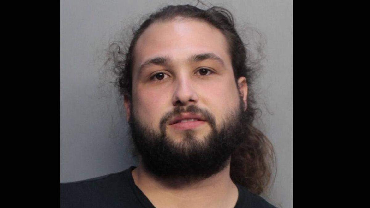 Michael Santana, 24, was charged this week with stealing dozens of checks worth tens of thousands of dollars that were written out to the office of the Miami-Dade County clerk, depositing them into personal bank accounts and cashing them. He’s facing a grand theft charge.
