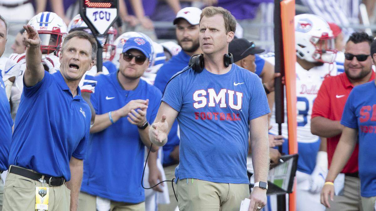 Then-SMU Mustangs offensive coordinator Rhett Lashlee looks on from the sideline during the college football game between the SMU Mustangs and TCU Horned Frogs on on Sept. 21. UM recently hired Lashlee as offensive coordinator and quarterbacks coach. (Photo by Matthew Visinsky/Icon Sportswire) (Icon Sportswire via AP Images)