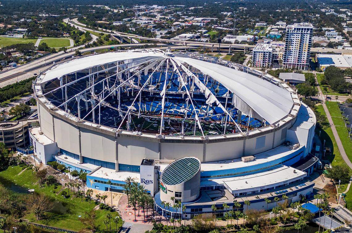 An aerial view shows the tattered roof of the Tropicana Field, home of the Tampa Rays baseball team, ripped off by Hurricane Milton’s powerful winds overnight Wednesday, October 10, 2024.