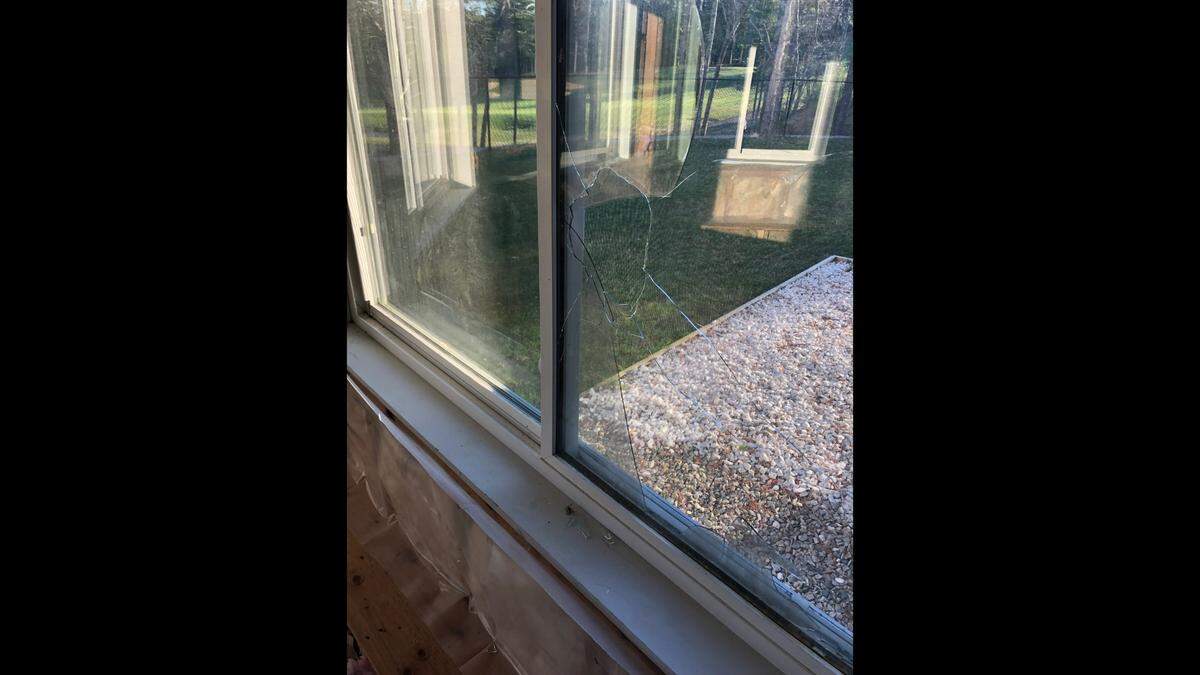 In this photo, one of the Tenczar family’s broken windows caused by a golf ball is seen, according to attorney Robert Galvin. This photo was used as evidence in the Tenczar’s lawsuit against Indian Pond Country club.