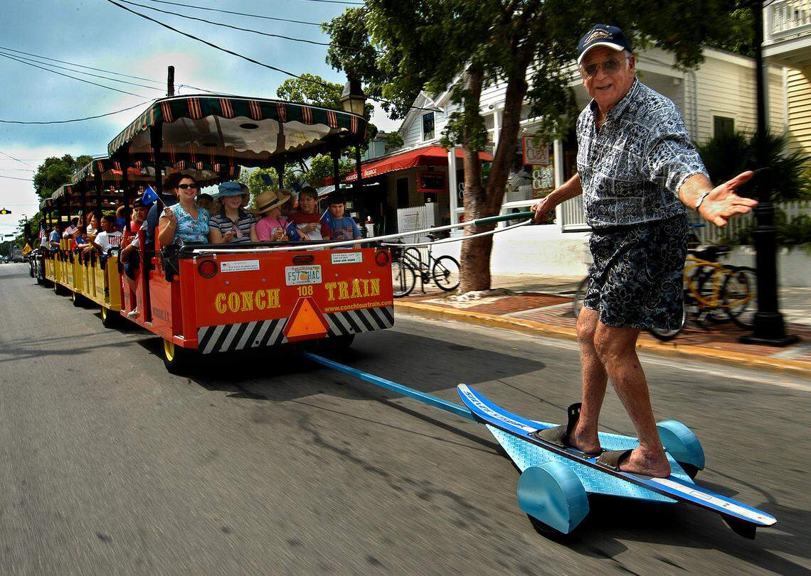 Former Key West Mayor Charles “Sonny” McCoy, 75, is towed down Duval Street in Key West on Sept. 10, 2003, to commemorate the 25th anniversary of his Sept. 10, 1978, water-skiing trip from Key West to Cuba.