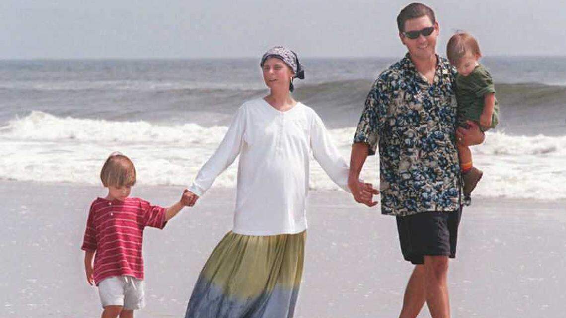 A family strolls on Atlantic Beach in Florida in this file photo.