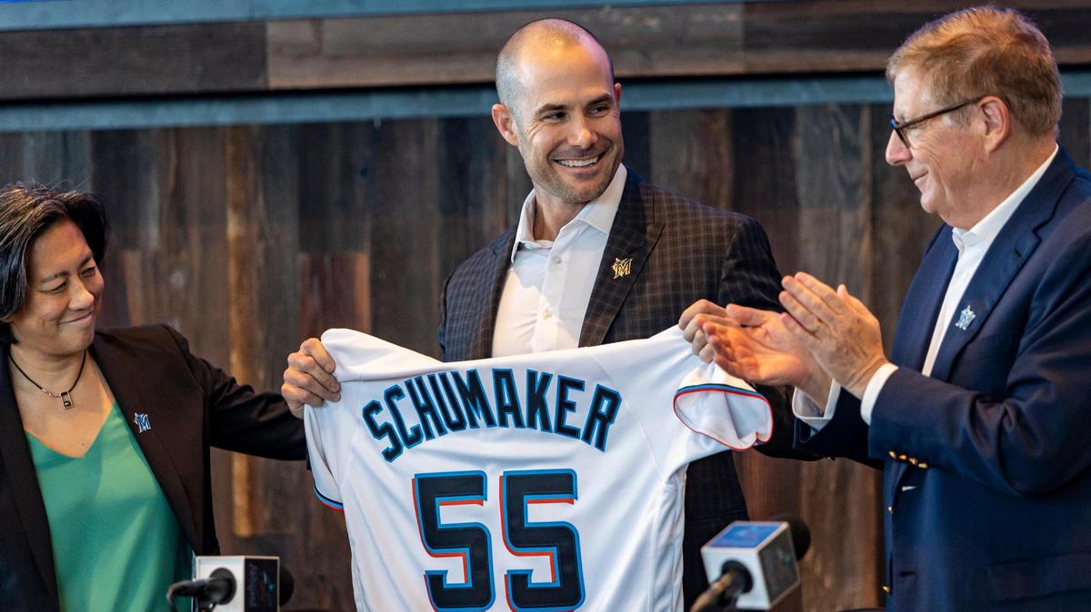 Miami, FL- November 3, 2022 - Skip Schumaker, center, was named the 16th manager in Marlins history. Making the announcement are Marlins general manager Kim Ng, left and Marlins chairman and principal owner Bruce Sherman, right. This will be the first managerial job for Schumaker, who played 11 Major League seasons with the Cardinals, Dodgers and Reds from 2005-15