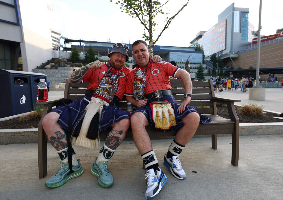 Scotland fans pose for pictures ahead of the 2026 World Cup Group C football match between Haiti and Scotland at the Boston Stadium in Foxborough on June 13, 2026. (Photo by FRANCK FIFE / AFP via Getty Images)