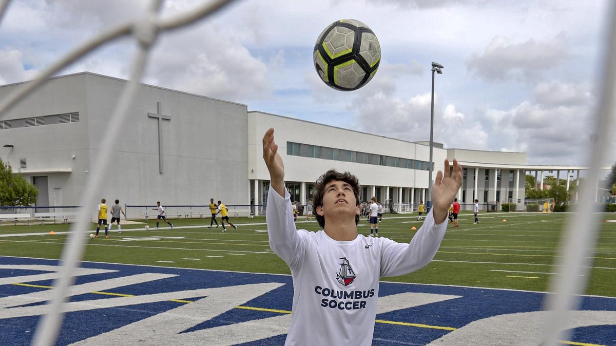 Columbus soccer standout Joaquin Real 18, senior, who is partially deaf in both ears, attends a short practice with teammates at Christopher Columbus High School on Wednesday, November 6, 2019 in Miami, Florida.