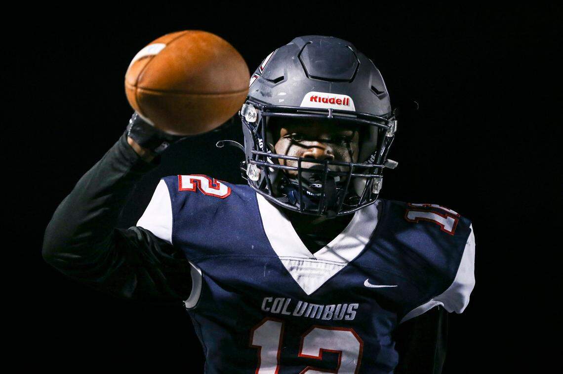 Columbus Explorers wide receiver Darriel Harper (12) celebrates with the football after scoring a touchdown during the third quarter of a high school football playoff game against the Palmetto Panthers at Tropical Park in Miami, Florida, Friday, November 18, 2022.
