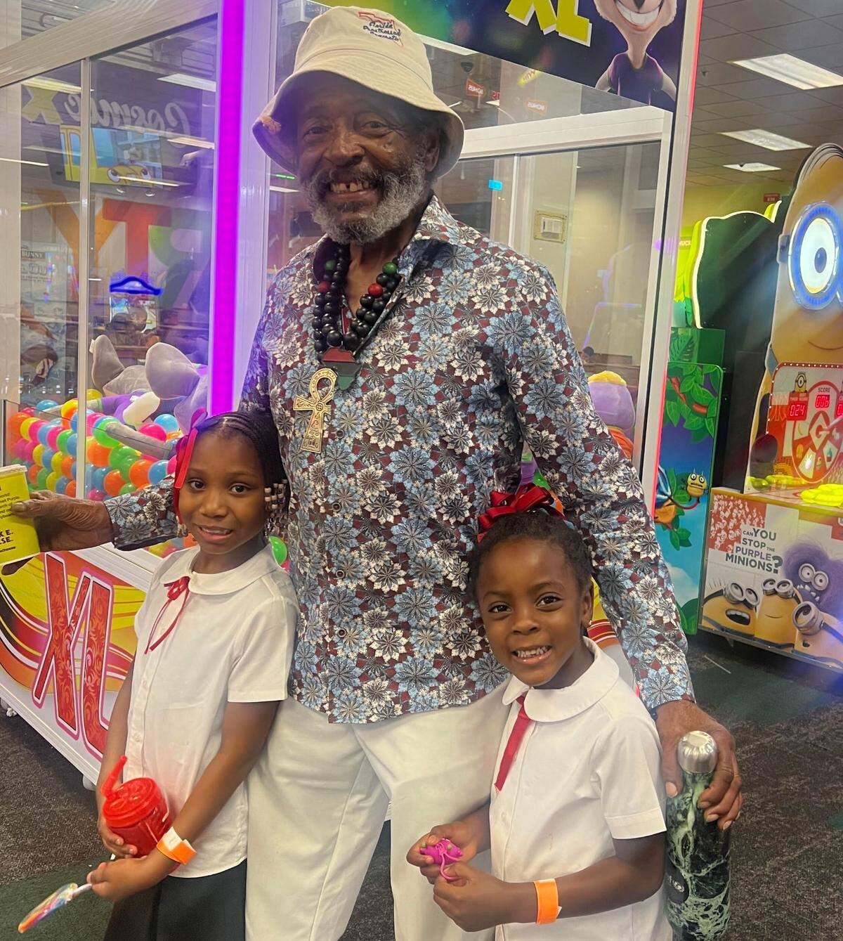 Michael Clarkson with his granddaughters Spirit (left) and Summer (right).