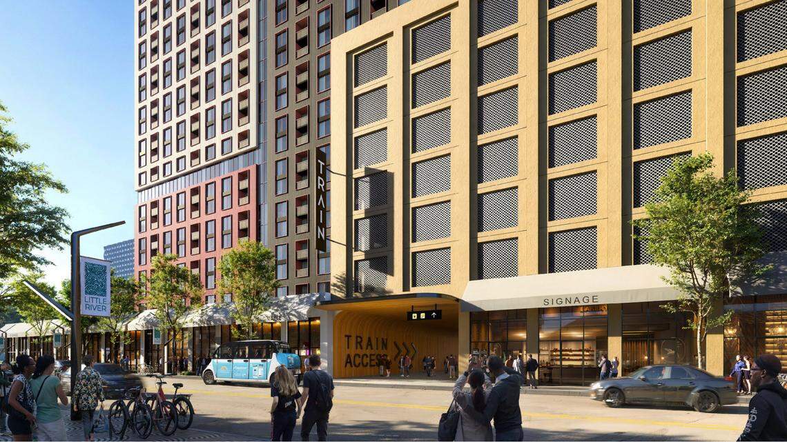 Representación del Swerdlow Group muestra un distrito comercial y residencial y la entrada a una nueva estación de trenes de cercanías Tri-Rail que se construiría bajo una propuesta que apunta a transformar una amplia franja del vecindario Little River-Little Haiti de Miami.